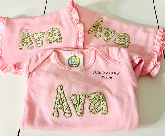 Pink gown, burp cloth, bib set