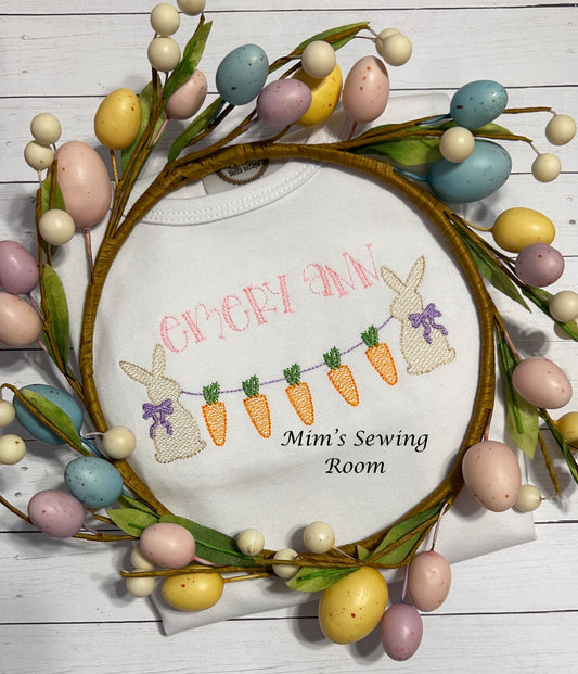 Bunny with bows and carrots on string