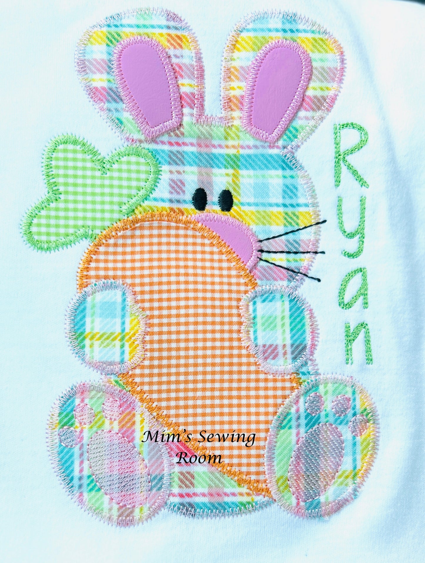 Plaid bunny holding carrot