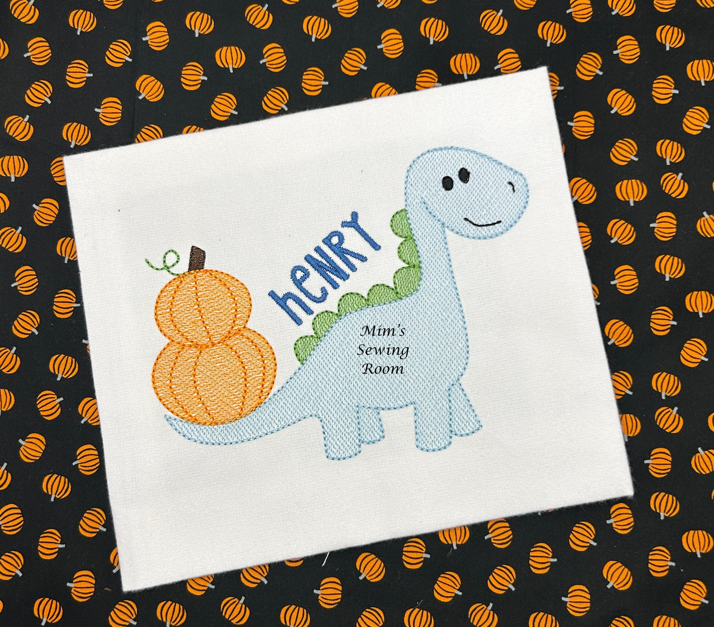 Pumpkins on dinosaur tail