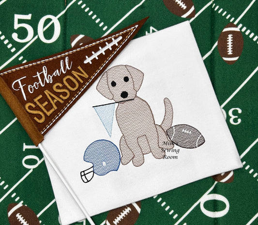 Football dog with pennant, helmet, and football
