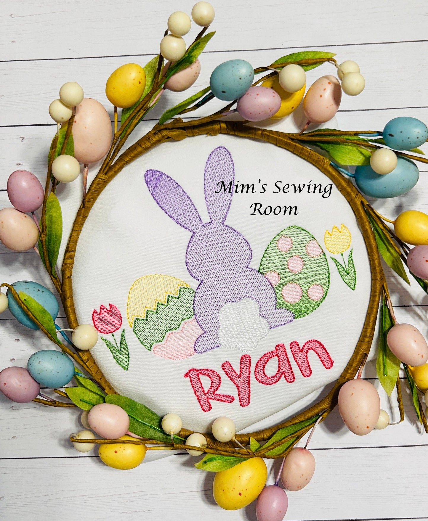 Sketch bunny with eggs and tulips