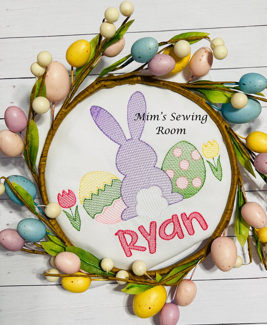 Sketch bunny with eggs and tulips