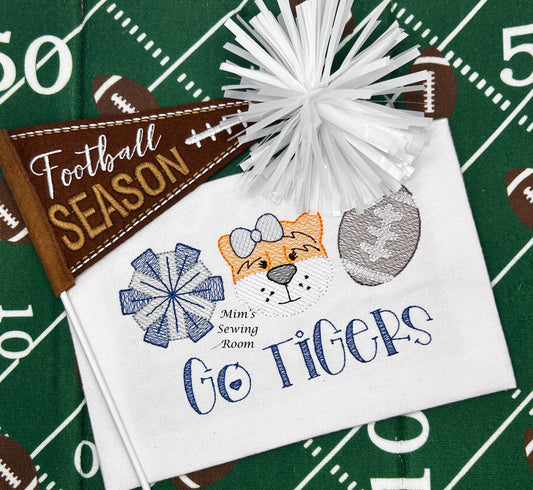 Tiger trio with pompoms and football