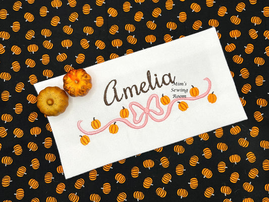 Mini pumpkins with bow