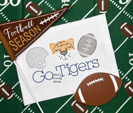 Tiger trio with helmet and football