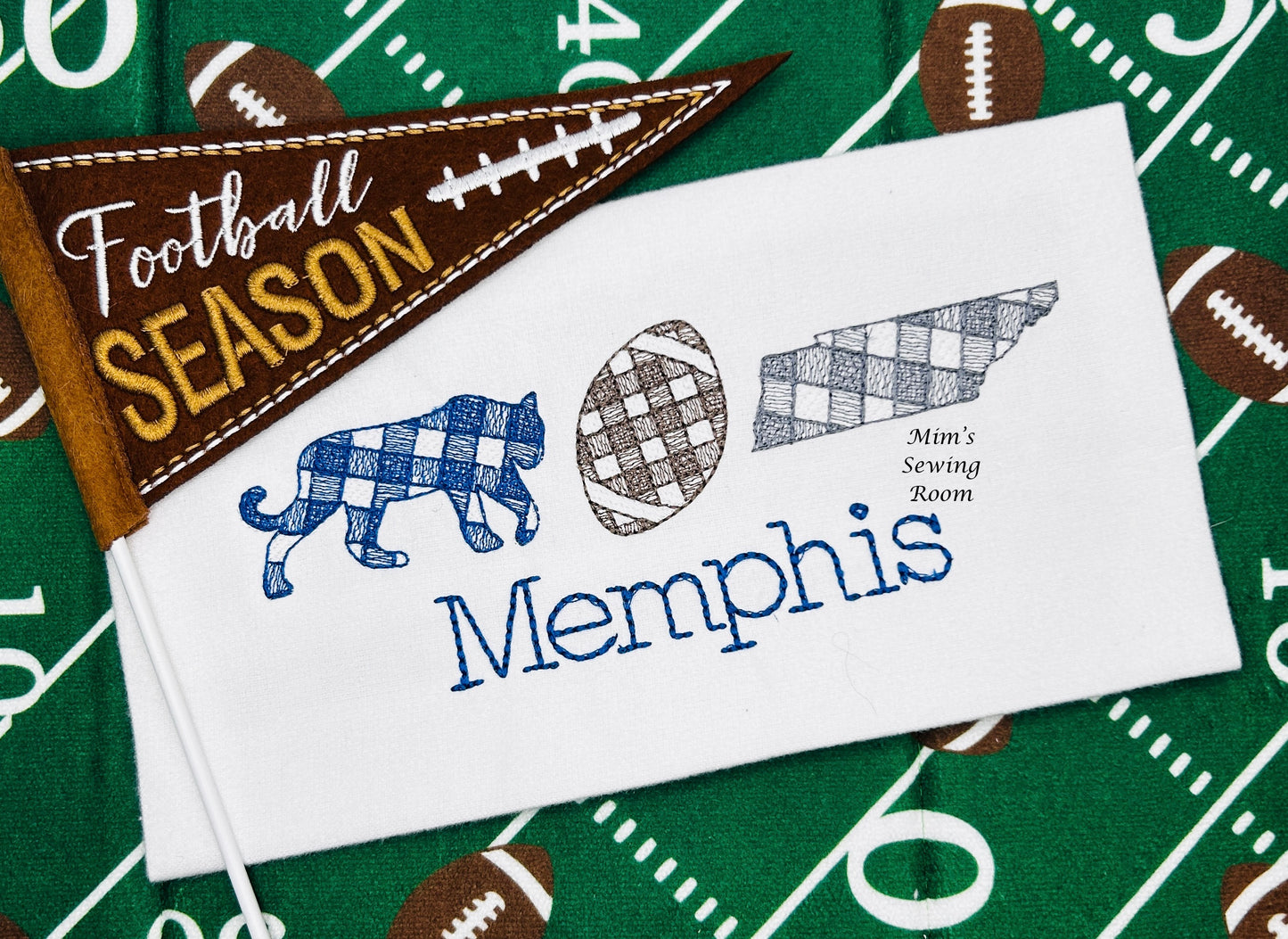 Tiger trio with state and football